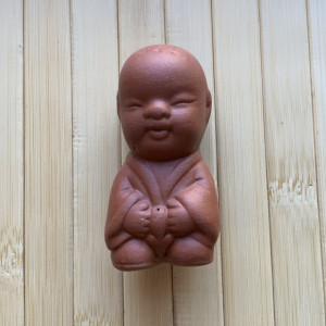 Чайная фигурка глиняного мальчика